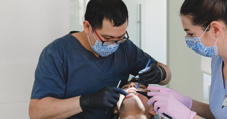 Dental hygienist cleaning a patient's teeth — addressing bleeding gums when brushing