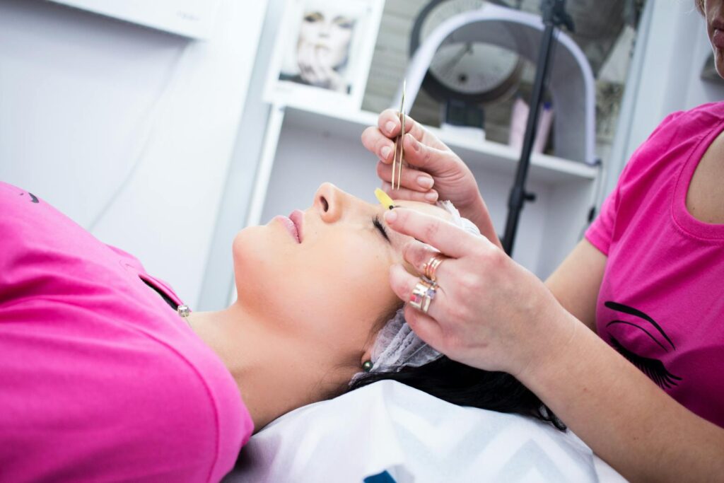 Patient receiving facial care at a dermal fillers consultation in Archway