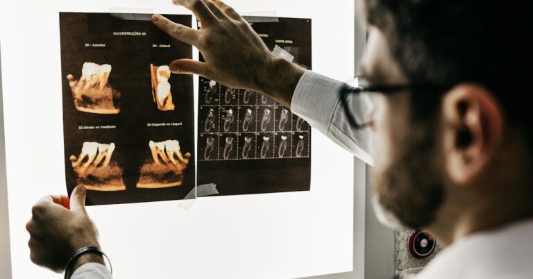 Dentist reviewing teeth X-rays before a dental implant procedure in a North London clinic