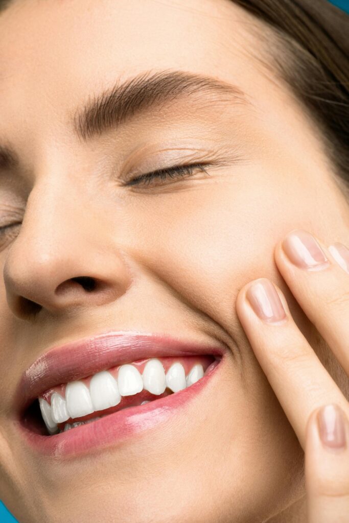 Close-up of a person smiling, with naturally shaped lips, illustrating dentist-led lip filler treatment in Archway, North London