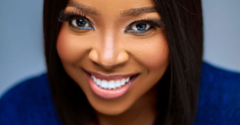 Smiling woman with an even, bright smile after a smile makeover in Archway