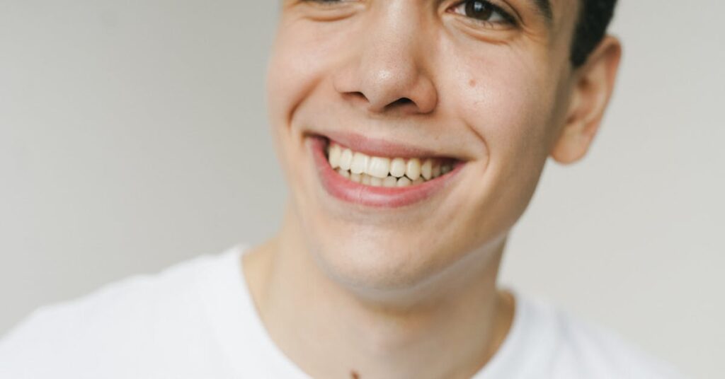 Close-up of a confident smile after composite bonding
