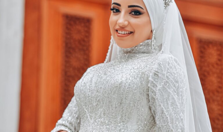 Smiling bride in white wedding dress with confident smile — wedding smile makeover London